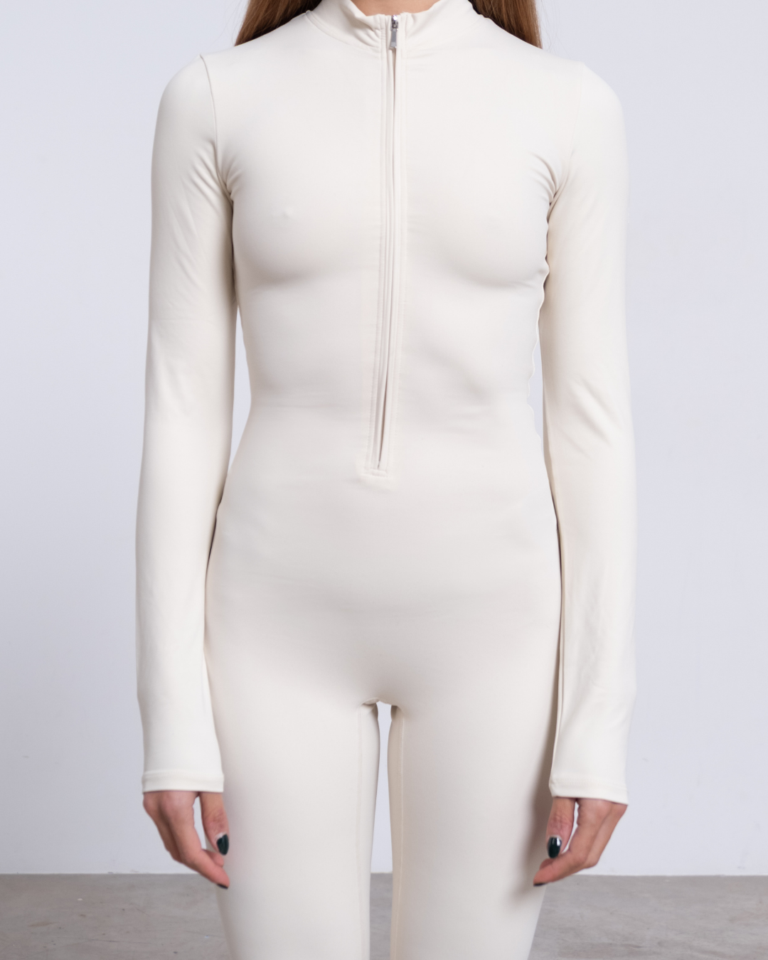 JADE MONO DEPORTIVO MANGA LARGA EN CREMA